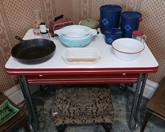 10 inch Cast Iron Pan, Beautiful Enamel Top Table, Vintage Tupperware Cannister Set, Pyrex Butterprint Mixing Bowl Set.