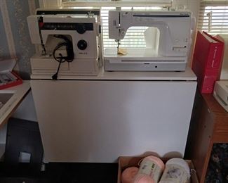 Husqvarna Viking  Mega Quilter Sewing machine (right) and a Nelco Sewing Machine. Nice Variety of Sewing Items, Machines and Tables.
