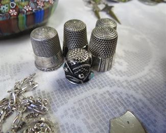 Sterling thimbles.