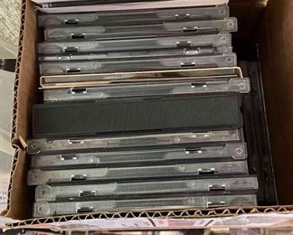 Assortment of CDs, VHS, Books and Shelf