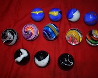 Fabulous Collection of Swirl Core/Flame Swirl Marbles! Highly Collectible many Rare! These in this picture are large marbles. The height of all marbles runs from 1"inch t o 2"inches with a total of 92 altogether. Marbles will sell as a collection.