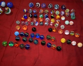 Fabulous Collection of Swirl Core/Flame Swirl Marbles! Highly Collectible many Rare! These in this picture are large marbles. The height of all marbles runs from 1"inch t o 2"inches with a total of 92 altogether. Marbles will sell as a collection.