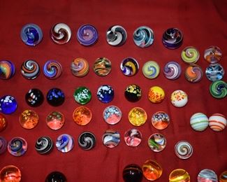 Fabulous Collection of Swirl Core/Flame Swirl Marbles! Highly Collectible many Rare! These in this picture are large marbles. The height of all marbles runs from 1"inch t o 2"inches with a total of 92 altogether. Marbles will sell as a collection.