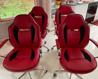 Red and black leather kitchen chairs on casters