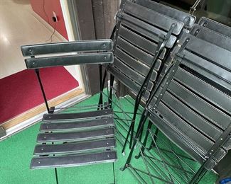 6 leather folding chairs.