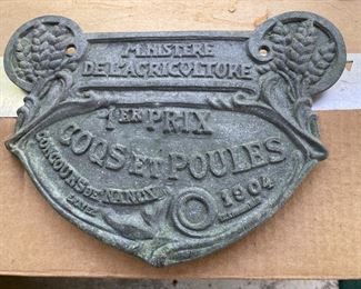 Cast metal plaque in French. I think it reads something like: ‘Minister of Agriculture 1st Prize roosters and hens 1904’. It is, most likely, a one of a kind!
