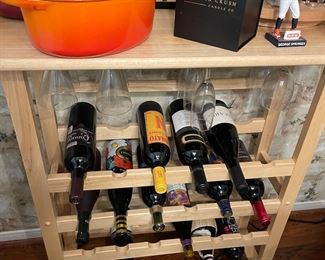 Rolling wine rack with wine