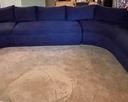 Lovely and Luxurious Eggplant Colored Sectional Sofa / Couch with Two Ottomans is as comfortable as it looks! This sofa measures 33 inches tall, 33 inches deep, 156 inches wide, 72 inches left side and 96 inches right side. Each of the ottomans measures 32 x 28 x 18 inches. Very good condition! 