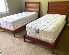 Pair of Vintage Twin Bed Frames each have a headboard with a lovely slight curved design. Each measures 41 x 48 inches