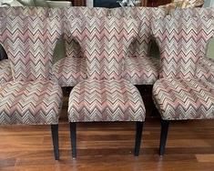 Set of Seven Contemporary Dining Room Upholstered Chairs each measuring 22 x 20 x 38 inches. These chairs feature a nice sleek design with sculpted backs and would compliment any dining room table elegantly! 