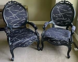 Pair of Beautiful Black Accent Chairs. Lovely set of wood framed chairs accented with contemporary style fabric making for a wonderful combination. Each measuring 41 x 25 x 26 inches. Unique and gorgeous! 