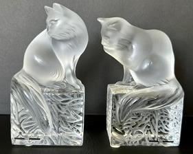 Pair of Lalique Cat Figurine Paperweights, each measuring six inches tall. 