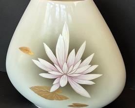 Vintage H & Co Selb Bavaria Heinrich Vase, measuring 10.5". Item in very good condition with no noted chips or cracks. 