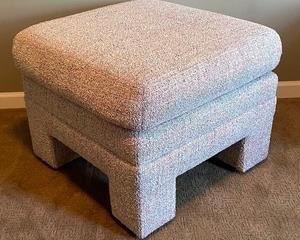 Custom Made Ottoman on Casters by Classic Gallery that measures 27 x 27 x 21 inches. Looks like a great place to put your feet up and relax! 