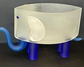 Glass Studio Artist Borowski Ben Elephant Figurine. The elephant can be used as a bowl or glass sculpture, as you wish.

Measures 6.8 inches tall and 12" long. A very fun and unique decor piece! 
