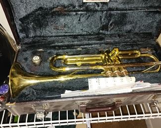 Trumpet brass musical instrument needs repair