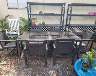 7 PC Patio Set Metal table with glass top, 6 chairs and cushions $350