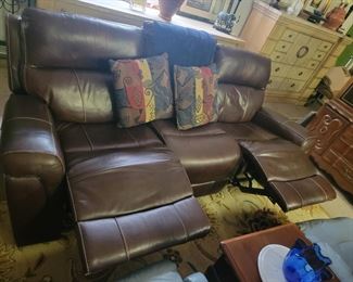 Reclining Sofa open some discoloration on headrest.