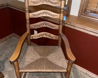 2 Carved ladderback woven seat, captains chairs