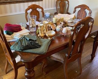 Lovely dining room table with chairs