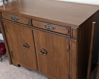 Cabinet that extends into table