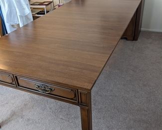 Cabinet that extends into table that seats 12