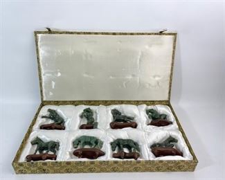 Lovely Vintage Serpentine Carved horse Jade statue set set of 8 total on wooden stands in original fitted box
