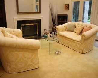 Pair Brunswig & Fils down filled sofas ; vtg glass waterfall table (Angelo Cortesi for Fiam?)