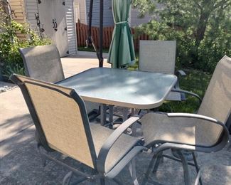 Pub height aluminum patio set with four chairs