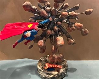 Signed Ron Lee Superman sculptures in marble.