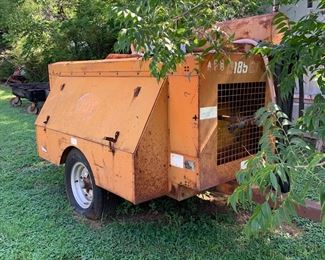 John Deere engine, diesel compressor on a pull behind trailer