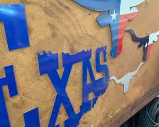Texas signs and steers
