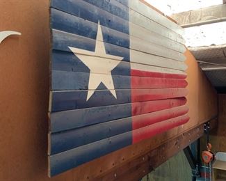 Texas flag on fence panel