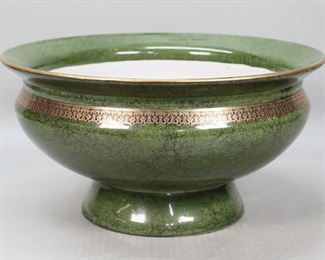 34	Porcelain Center Bowl	Porcelain center / serving bowl. Green faux marble,, with gilt rim and band. Unsigned. 7 5/8"H x 14 7/8"-diameter at top. Some discoloration to interior.
