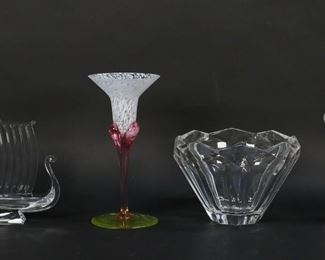 36	6 Piece Glass Lot Goebel, Lenox	6 piece crystal lot. Lenox bowl, 4 5/8"H x 7"-diameter; pair of Mikasa Ballet Lalique style candlesticks, each 9 1/2"H; Goebel peacock figure, 7 1/8"H; Durand boat figure, 5 3/4"H; art glass champagne flute, 7 3/4"H.
