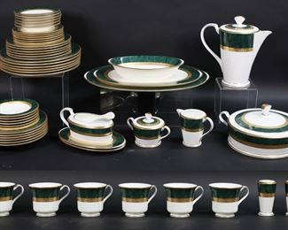37	54 Piece Noritake Fitzgerald Porcelain Dinner Set	Noritake Fitzgerald pattern porcelain dinnerware, service for 6. 54 pieces: 6 dinner plates, 6 salad plates, 6 bread & butter plates, 6 cups and 6 saucers, 6 berry bowls, 6 bowls, salt & pepper, oval platter, small oval platter, oval serving dish, gravy boat and underplate with extra underplate, round covered vegetable, coffee pot, sugar & creamer. Dinner plates 10 3/4"-diameter, large oval platter 16 3/4"L.
