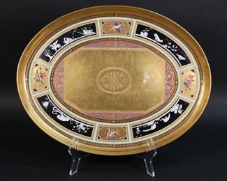 43	Vienna Style Porcelain Platter	Royal Vienna style porcelain platter. Gilt, with scenes of animals and mythological creatures and figures. Vienna style "beehive" shield mark to the underside. 17"L. Loss to gilt decoration at center and minor loss to decoration on rim.
