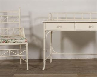 52	Hollywood Regency Style Faux Bamboo Desk and Chair	"Hollywood Regency style faux bamboo desk and armchair. 20th century. Faux bamboo form and two drawers. Armchair in geometric bamboo form with caned seat and cushion. Scuffs, stains and wear throughout top of table. Bentwood on right front of desk below drawer is missing. Repairs to bentwood on left front below drawer. Scuffs and marks to legs and feet of desk. Small split and crack to wood on left side of gallery. Remnants of Scotch tape residue on top edges of desk. Staining to fronts of drawers. Scuffs to wood and paint on front legs of chair. 

Desk: 39 3/4"" W x 22 1/8"" D x 35"" H. 49 lbs. Chair : 22 1/2"" W x 21 5/8"" D x 39 1/4"" H. 12 lbs.

"
