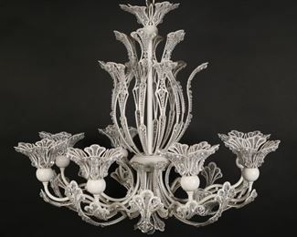 59	Hollywood Regency Style White Metal Chandelier	"Hollywood Regency style chandelier. 20th century. White metal, glass crystals, eight lights. Shades from each light are removable. Underwriter's Laboratory labels on inside of each ceiling medallion. Lighting has not been tested.

21"" H x approximately 26"" W."

