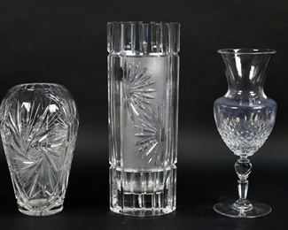 94	3 Crystal Vases	3 glass vases. Crystal vase, 10 1/8"H; cut crystal vase, 8"H; Dresden crystal vase with frosted panels, 11 3/4"H.
