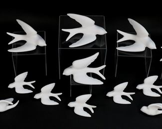 95	15 Bisque Porcelain Doves	15 bisque porcelain decorative wall hanging doves in various sizes. Largest 6 1/2"L.
