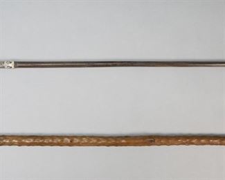 101	2 Figural Canes	2 figural canes / walking sticks. Wooden cane with Indian silver and brass elephant form handle and silver and brass tip, 42"L; naturalistic wooden cane with carved bone bird form handle, 37 1/8"L. Losses to decoration on elephant cane, apparent repair to trunk; bird handle one eye repaired, one eye missing. From the collection of a prominent Connecticut family.
