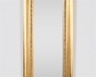 104	Regency Style Hall Mirror	"Regency style hall mirror. 20th century. Gilded composite frame with ribbon motif holding beveled mirror. Light wear to frame and mirrored surface. Scratches to surface of frame.

40 3/4"" x 9 1/4"". 8 lbs."

