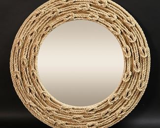 124	Rustic Nautical Style Rope Frame Mirror	"Rustic nautical style rope frame mirror. 21st century. Circular form mirror with manila rope frame tied into square knots. Light scuffs to surface of mirror. 

24 3/4"" diameter. 8 lbs."
