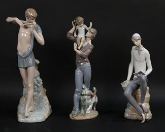 152	3 Porcelain Figures Lladro & Nao	3 porcelain figures. Lladro Walk With Father, 5751, 13 5/8"H; and Hebrew Student, 4684, 11 1/2"H; Nao boy playing flute, 14 3/4"H.

