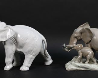 163	2 Porcelain Elephants Royal Dux & Lladro	2 porcelain elephant figures. Royal Dux elephant, 12 1/2"L x 10"H; Lladro elephant group, 4765, Maternal Elephant, 9 1/2"L x 7 1/8"H. Dux elephant tusks repaired.
