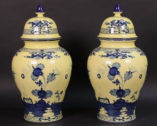 170	Pair Ginori Oriente Italiano Porcelain Ginger Jars	Pair of Richard Ginori Oriente Italiano pattern Chinese style porcelain lidded ginger jars. Yellow with blue Chinoiserie decoration. Each 15"H.
