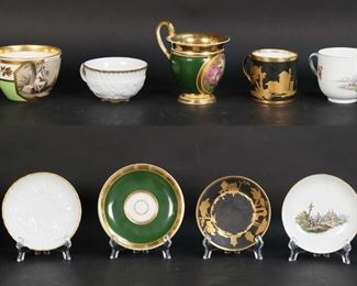 177	7 Porcelain Cups & Saucers Including Meissen	"Vienna style La Tendresse, hand painted scene of a woman with bird, gilt decoration, blue Royal Vienna style ""beehive"" mark; Vienna style with hand painted floral decoration, impressed Vienna style ""beehive"" mark; Chinoserie village scene, unmarked; Capodimonte style cup with relief scene of cherubs, blue crown over NF mark (no saucer); cobalt and gilt decorated, Sevres style mark to the underside; Meissen Swan, blue crossed swords marks; Meissen with hand painted harbor and village scenes, blue crossed swords with dot marks. Cobalt cup 3""H, saucer 5 3/4""-diameter; hand painted Meissen cup 2 5/8""H, saucer 5 1/4""-diameter.
Losses to gilt decoration on La Tendresse cup and saucer; handle repaired on Chinoiserie cup, scratches to saucer, losses to gilt decoration on cup and saucer; scratches to cobalt cup and saucer, handle repaired; Swan saucer chip to rim."

