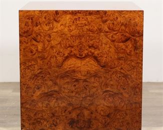 187	Mid Century Baughman Style Cube Pedestal Table	"Mid Century Modern cube pedestal table in the style of Milo Baughman (Goodland, KS, 1923-2003). 20th century. Cube form pedestal table in pressboard, executed in burlwood veneer and high-gloss finish. No apparent labels or maker's marks on table. Light fading, scuffs, and scratches to wood on top of table. Light wear throughout all sides of table.

24"" W x 24"" D x 24 1/2"" H. 73 lbs."
