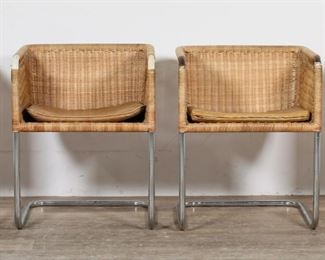 193	Four Harvey Probber D43 Style Mid Century Chairs	"Four rattan and chrome chairs in the style of Harvey Probber's (New York, 1922-2003) model D43 chair. Mid 20th century. Basket form rattan seats on cantilever chrome bases, each with a leather cushion. No apparent maker's marks or labels. Scuffs, tarnishing, and wear to chrome of chairs. Losses to rattan on arms of all chairs. Staining to rattan on arms of chairs. Small separations to rattan on sides of chairs. Wear, wrinkling, tears, and staining throughout leather cushions. 

21 1/2"" W x 20 1/2"" D x 27 5/8"" H. Each chair weighs 18 lbs."
